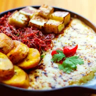 Tostones de Panapén con Alioli de Ajo Asado